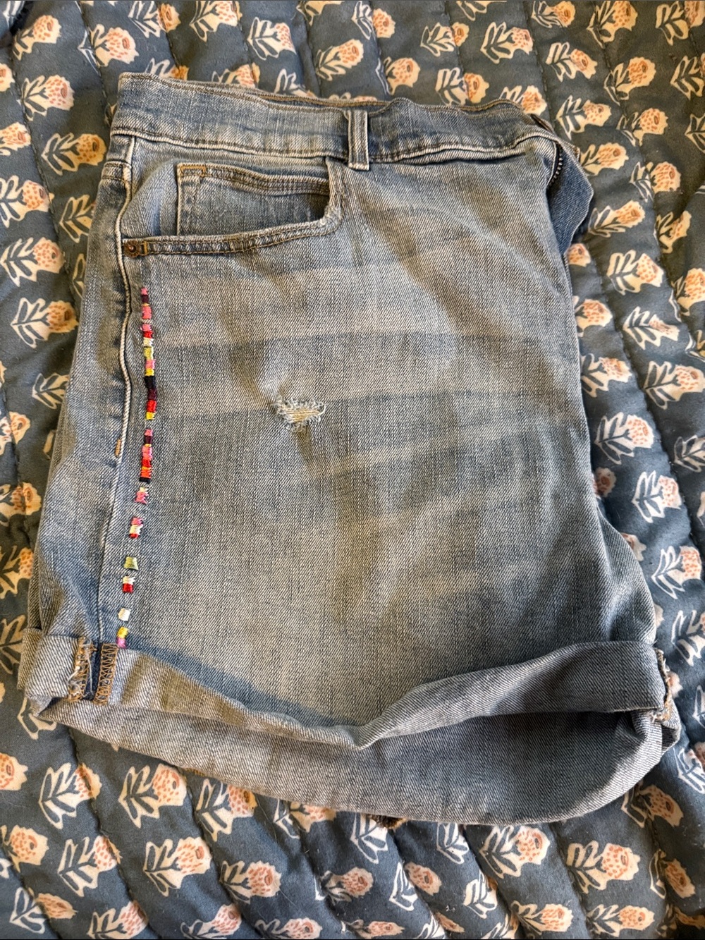 Blue Women's Distressed Denim Shorts with color stitched Trim